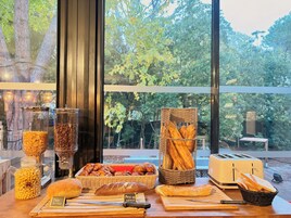 Daily buffet breakfast (EUR 18 per person)