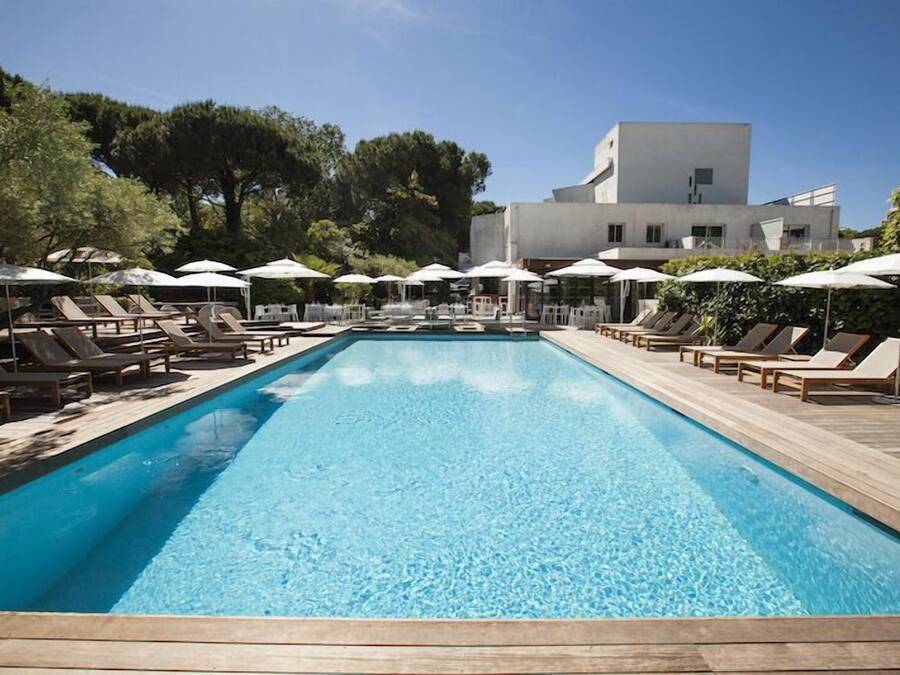 Seasonal outdoor pool, pool umbrellas, pool loungers