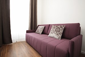 Suite – executive | Oppholdsområde | Flatskjerm-TV