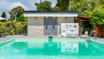 Seasonal outdoor pool, pool umbrellas, sun loungers
