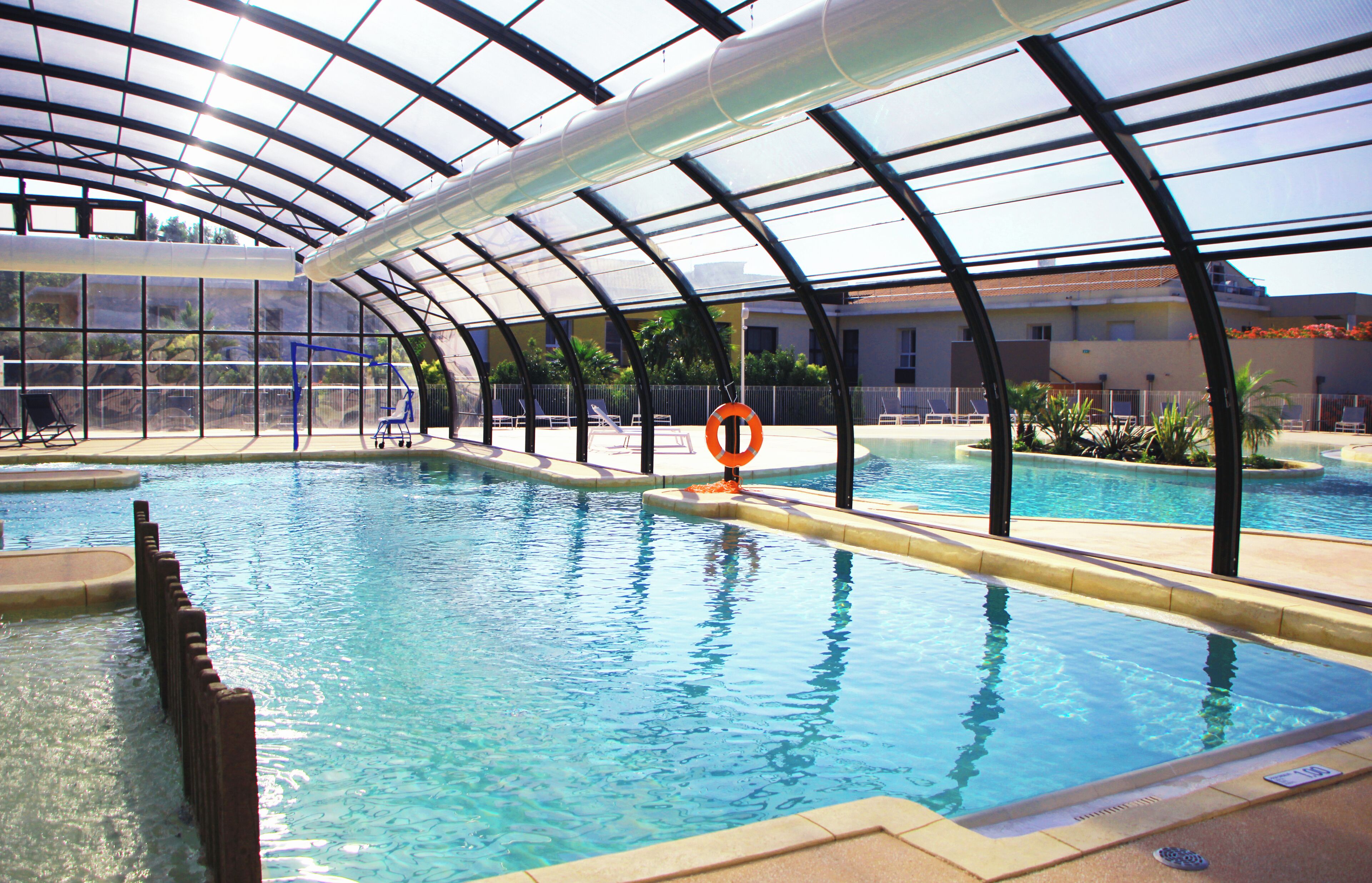 indoor pool, outdoor pool, pool umbrellas, pool loungers