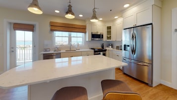 Winnapaug Pond Suite | Living area | Flat-screen TV