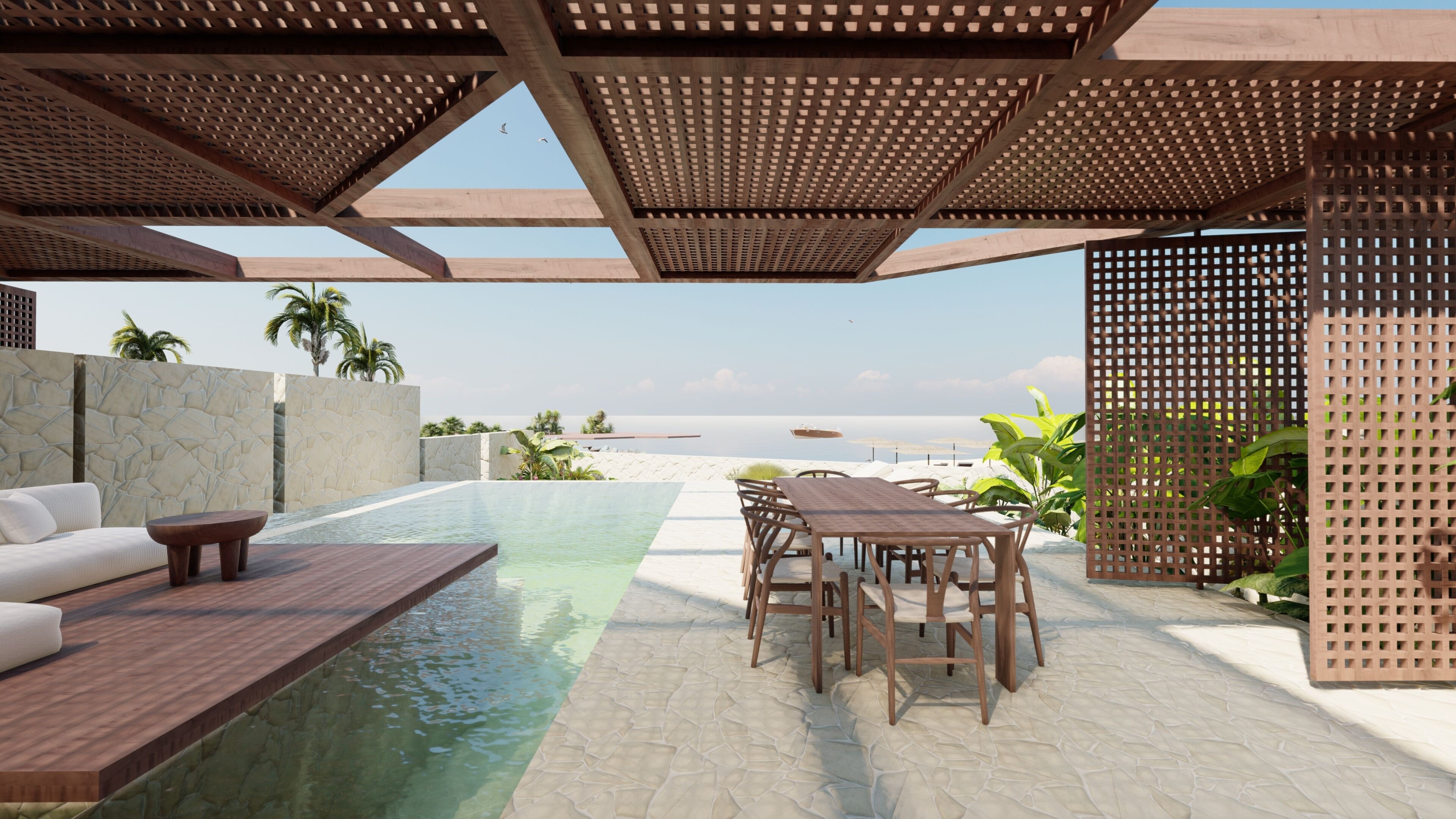 Ein Poolbereich mit Holzterrasse, Tisch und Stühlen sowie Blick aufs Meer.