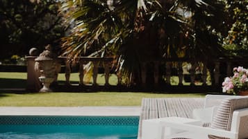 Outdoor pool, open 8:00 AM to 8 PM, pool umbrellas, sun loungers