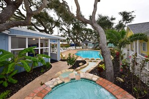 Outdoor pool, open 9 AM to 10 PM, pool loungers