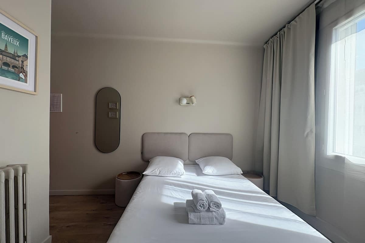 Desk, blackout curtains, free WiFi, bed sheets