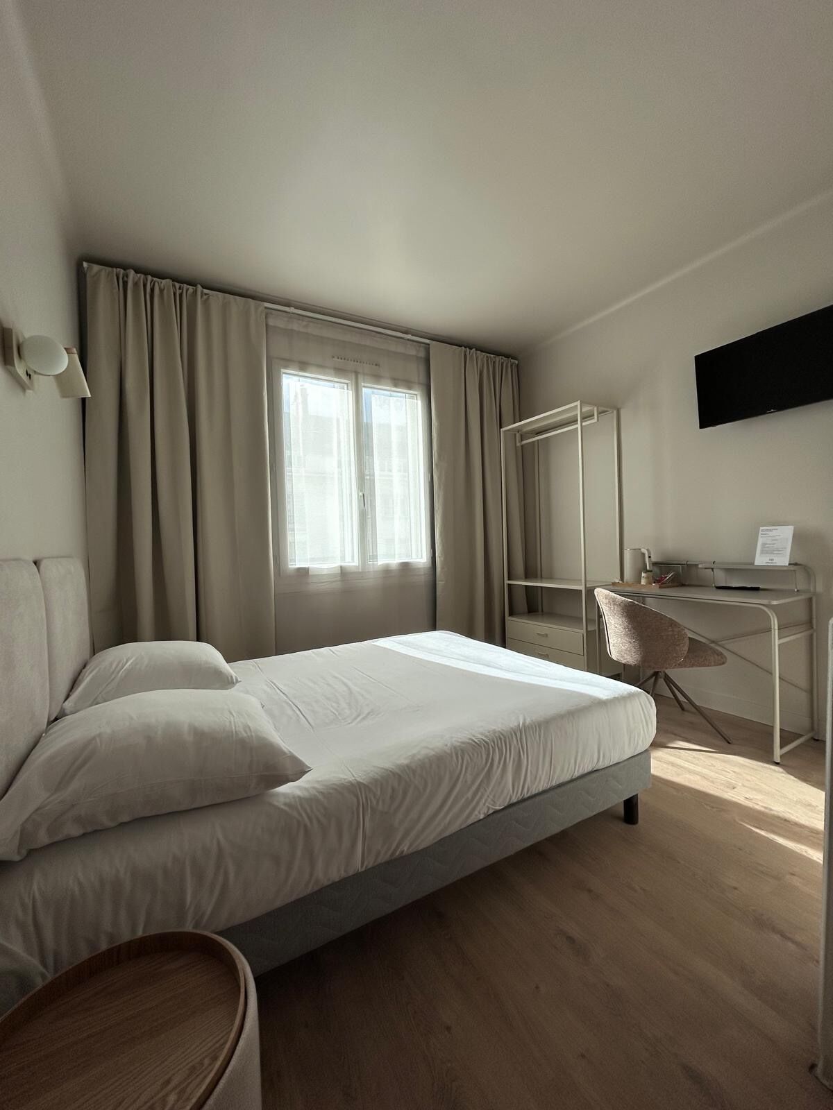 Desk, blackout curtains, free WiFi, bed sheets