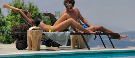 Indoor pool, seasonal outdoor pool, pool umbrellas, sun loungers