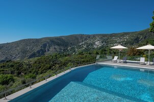 Indoor pool, seasonal outdoor pool, pool umbrellas, sun loungers