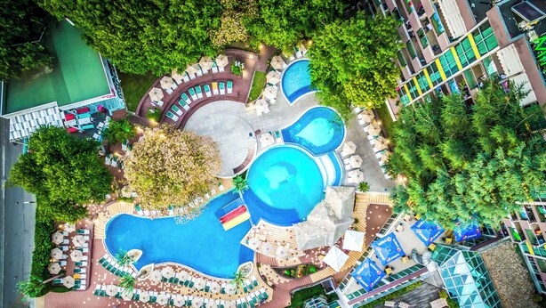 A resort with multiple swimming pools, sun loungers, and a variety of rooms. - Mimosa Sunshine Hotel COOEE - All Inclusive (Golden Sands)