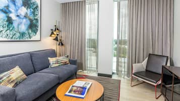 Suite, 1 King Bed with Sofa bed | Premium bedding, pillowtop beds, in-room safe, desk