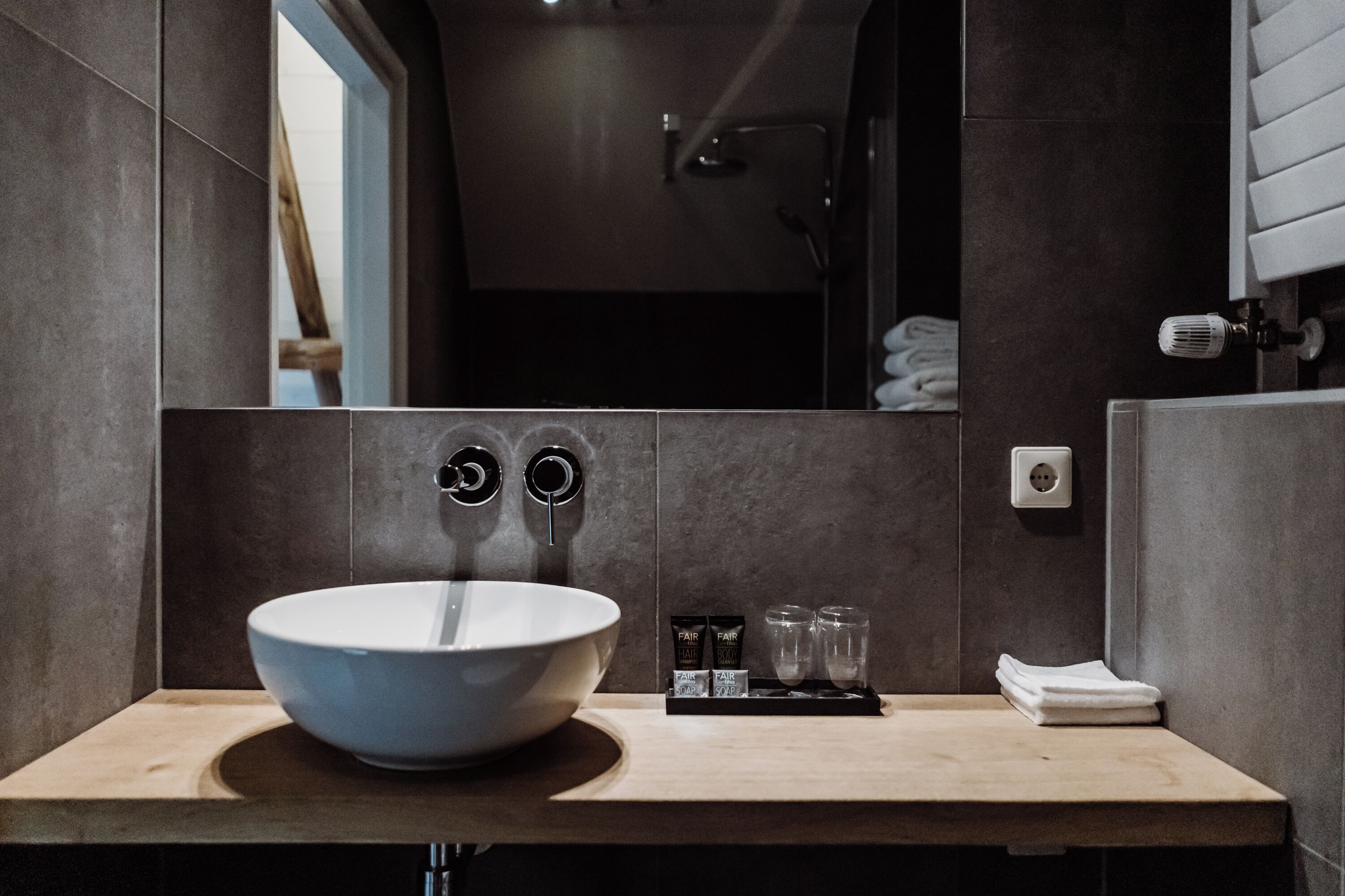 junior suite | bathroom | free toiletries, hair dryer, dressing gowns, slippers