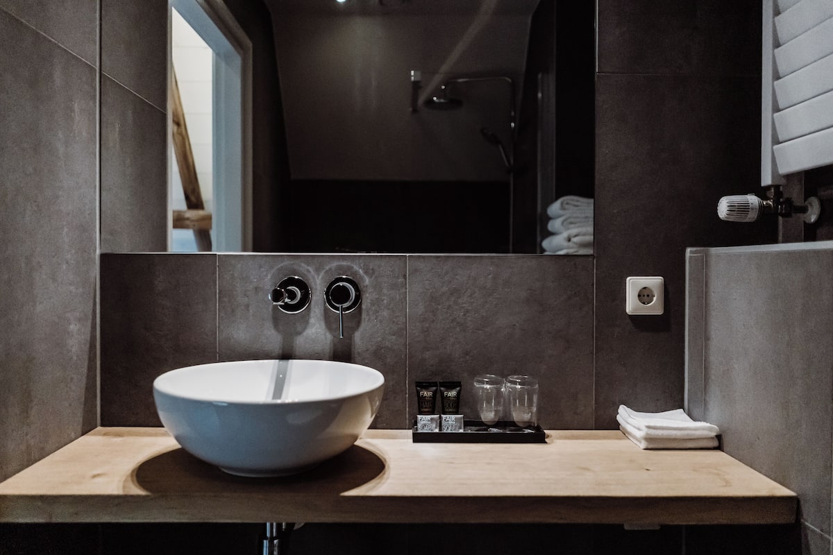 junior suite | bathroom | free toiletries, hair dryer, dressing gowns, slippers