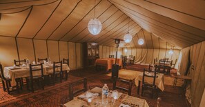 Breakfast, lunch, dinner served; local cuisine 