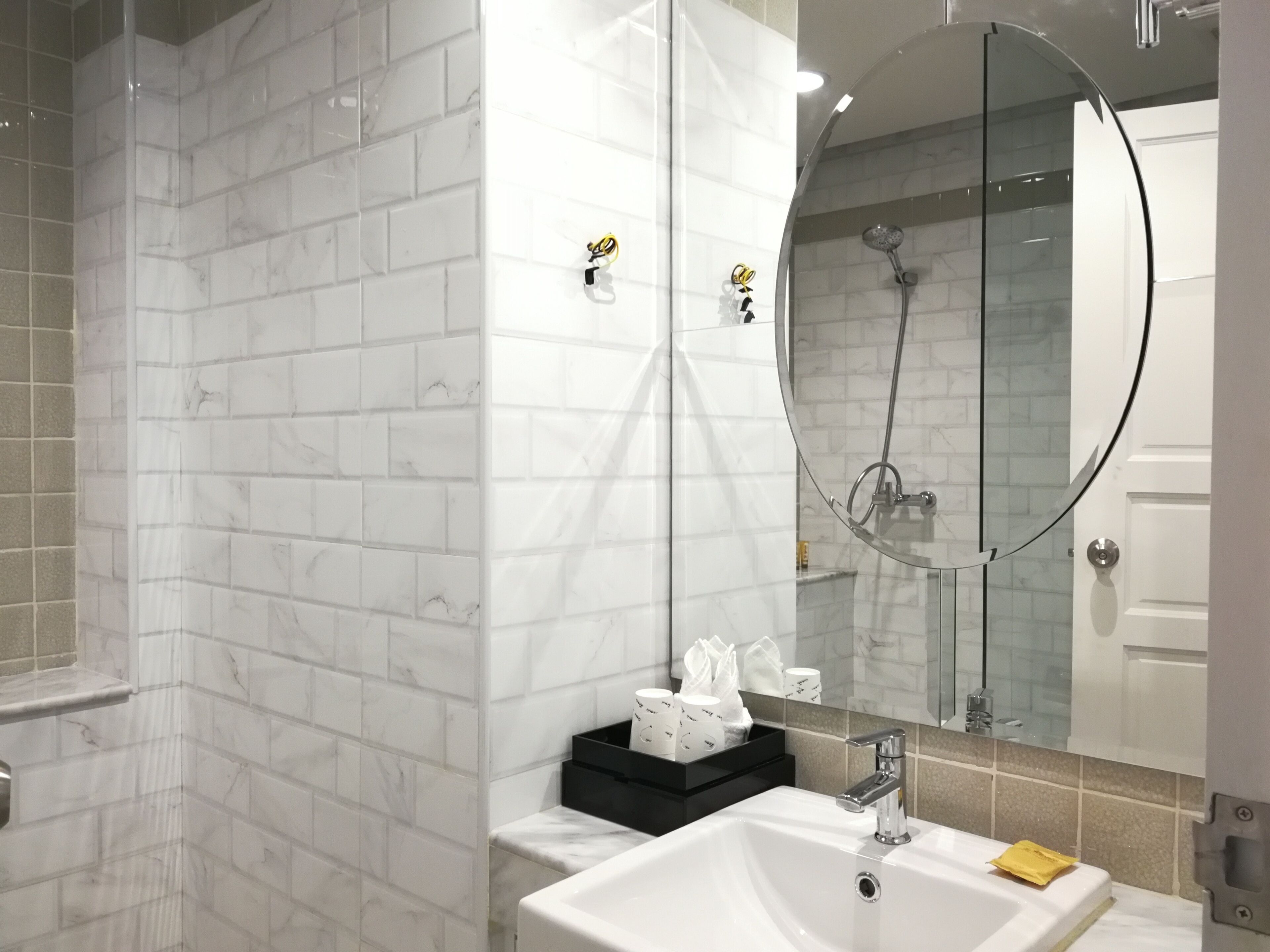 deluxe twin residence | bathroom | shower, free toiletries, hair dryer, bathrobes