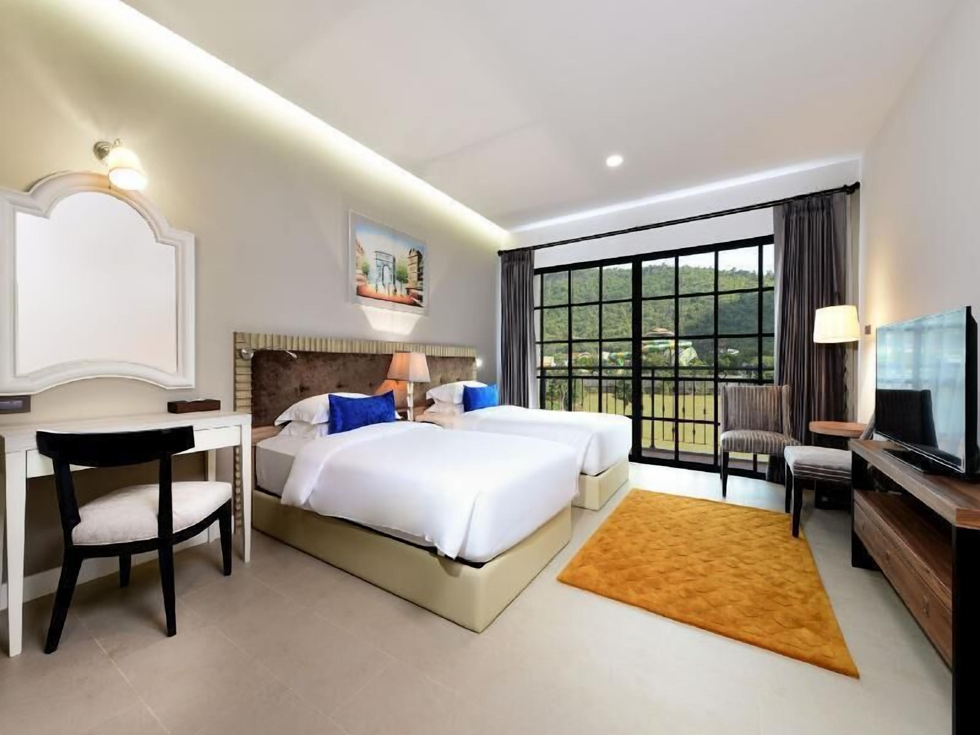 Minibar, in-room safe, desk, blackout curtains