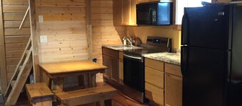 Authentic Fairbanks log house with bathroom, kitchen, and screened front porch