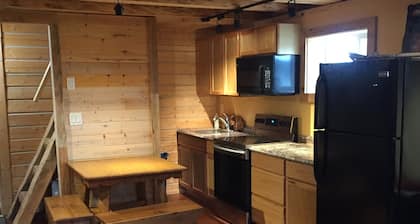 Authentic Fairbanks log house with bathroom, kitchen, and screened front porch