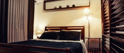 Premium Condo, 1 Bedroom, Non Smoking, Pool Access | 1 bedroom, in-room safe, desk, iron/ironing board