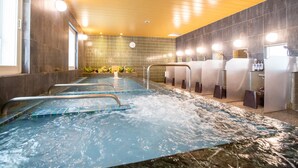 A modern indoor pool area with multiple lanes, a wooden ceiling, and tiled walls. - HOTEL J-SHIP OSAKA NAMBA (Osaka)