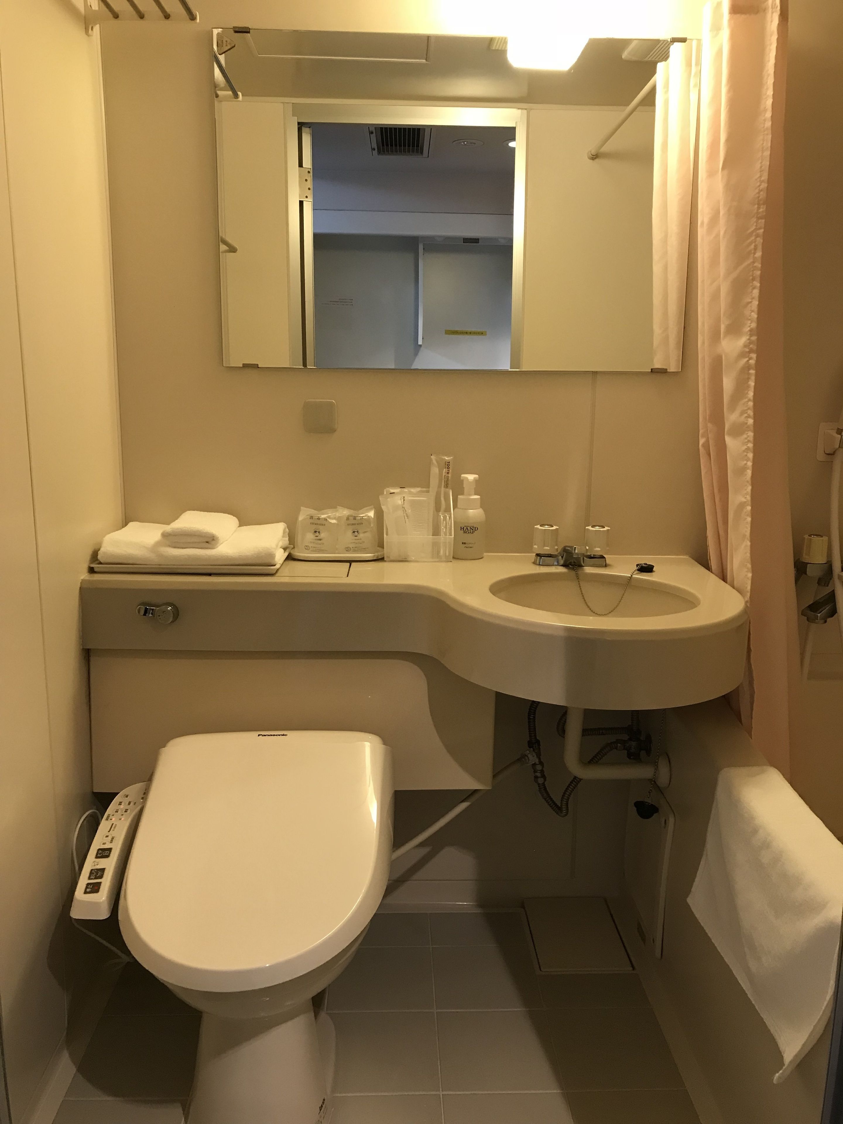 combined shower/bathtub, free toiletries, hair dryer, bathrobes