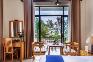 Luxury Double Room, 1 King Bed, Balcony, Beach View | Minibar, in-room safe, desk, laptop workspace - Santa Sea Villa Hoi An (Da Nang)