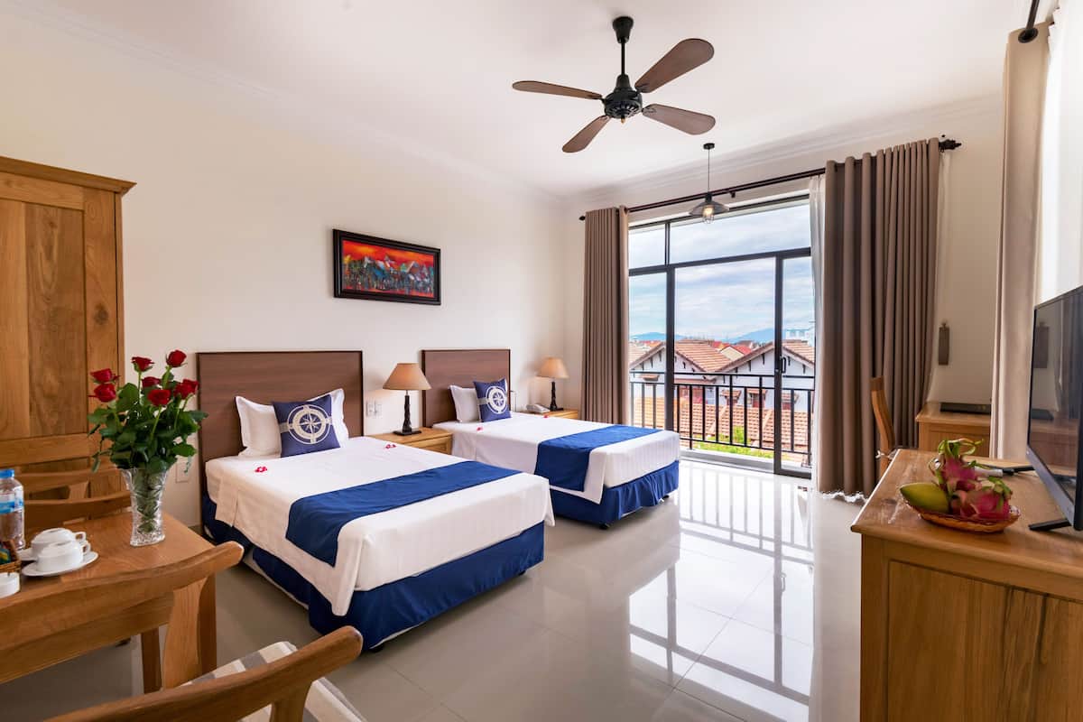 Superior Double or Twin Room, Partial Ocean View | Minibar, in-room safe, desk, laptop workspace