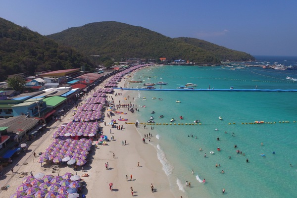On the beach, sun loungers, beach umbrellas, beach towels