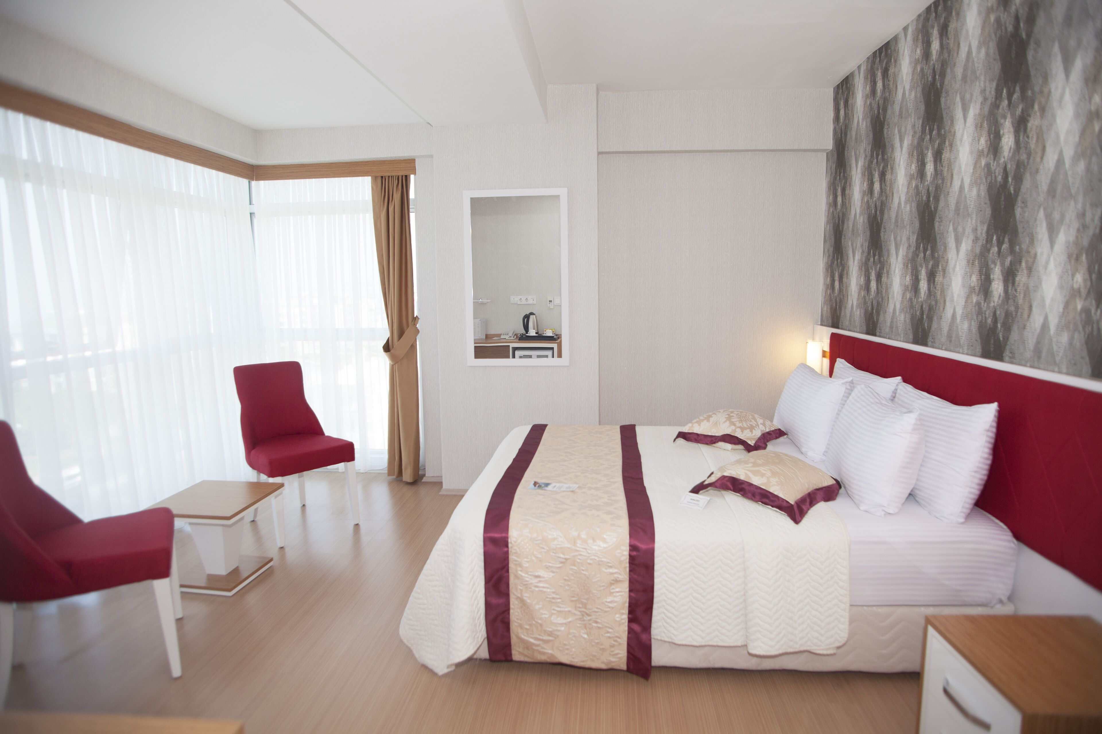 family room, 1 bedroom | premium bedding, minibar, in-room safe, desk