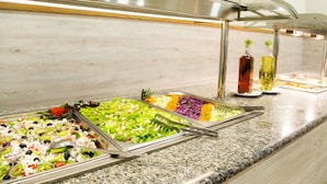 A buffet with various salads and dressings. - Ljuljak (Golden Sands)