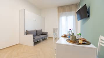 1 quarto, roupas de cama premium, escrivaninha