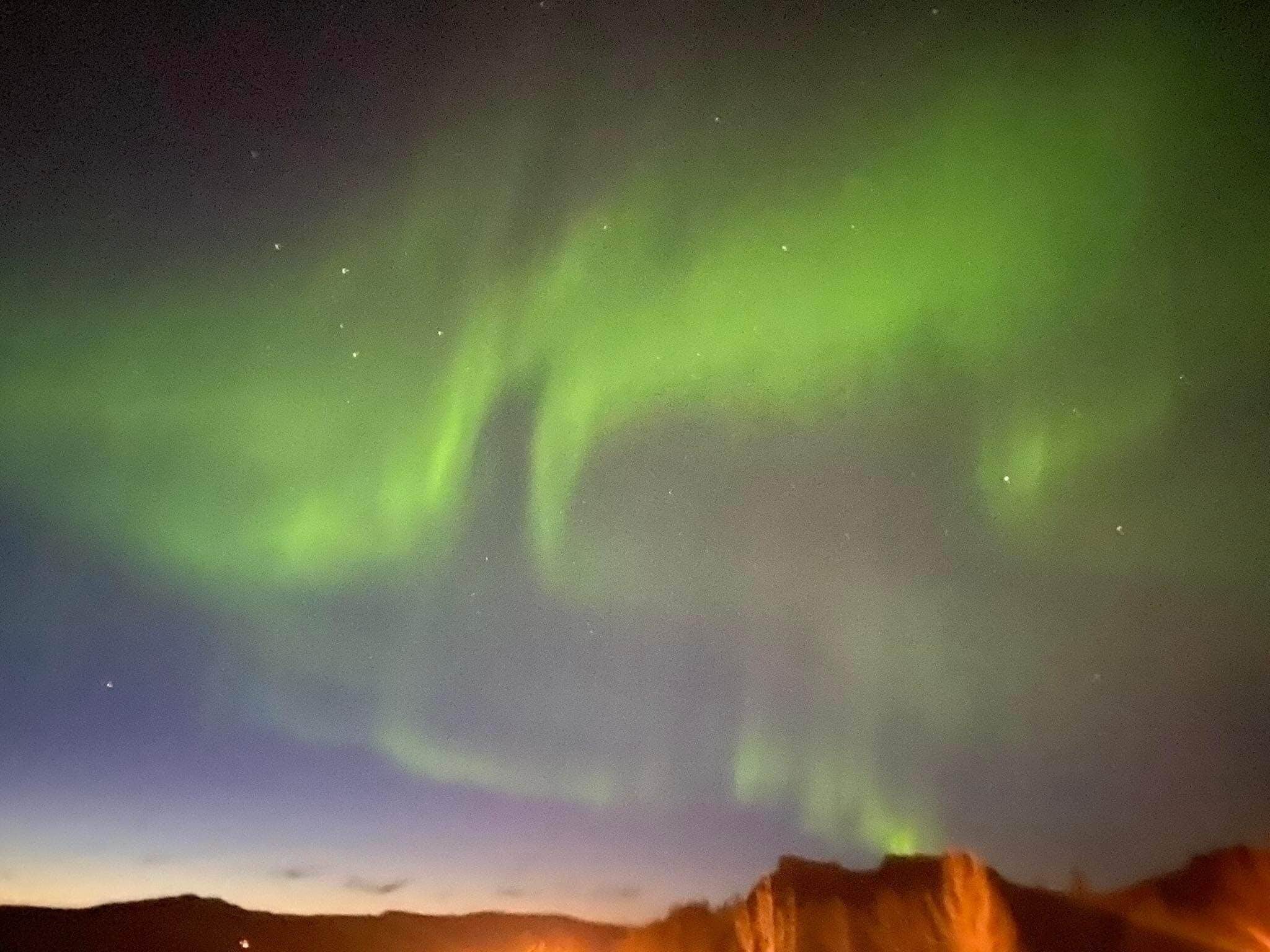 A night sky with the Northern Lights.