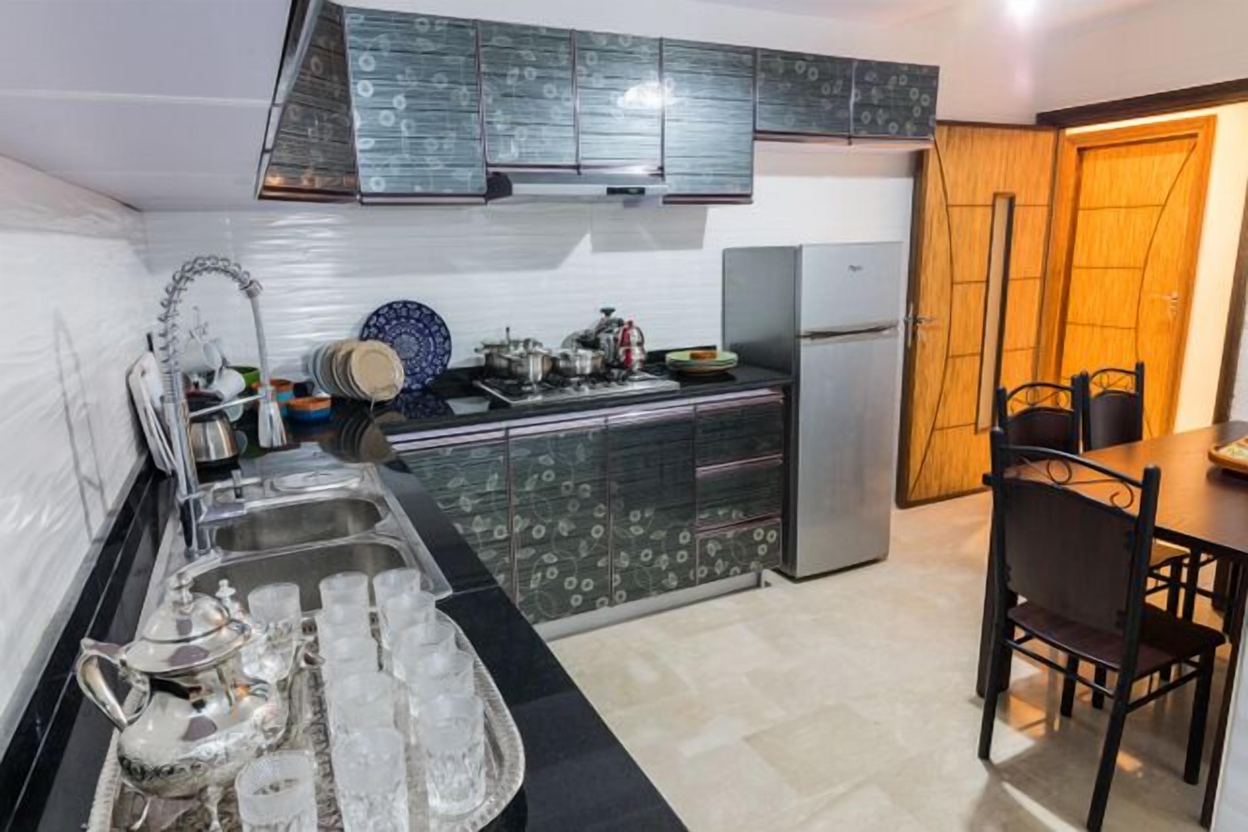 Apartment, 3 Bedrooms | Private kitchen | Full-sized fridge, stovetop, cookware/dishes/utensils