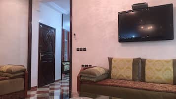 Apartment, 2 Bedrooms | Living room | Flat-screen TV