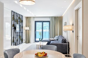 Suite, 3 Bedrooms, Sea View | Living area | Smart TV