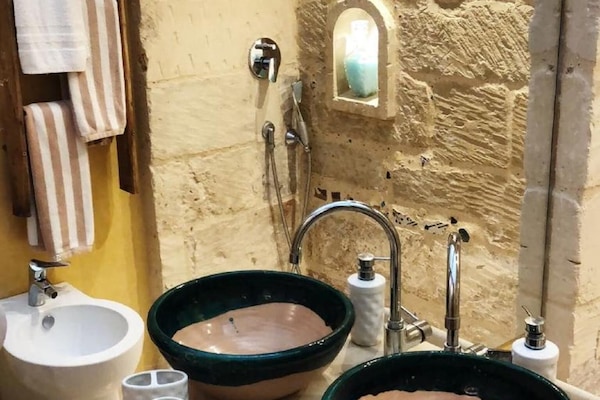 Family Room, 2 Bedrooms | Bathroom | Shower, free toiletries, hair dryer, bathrobes