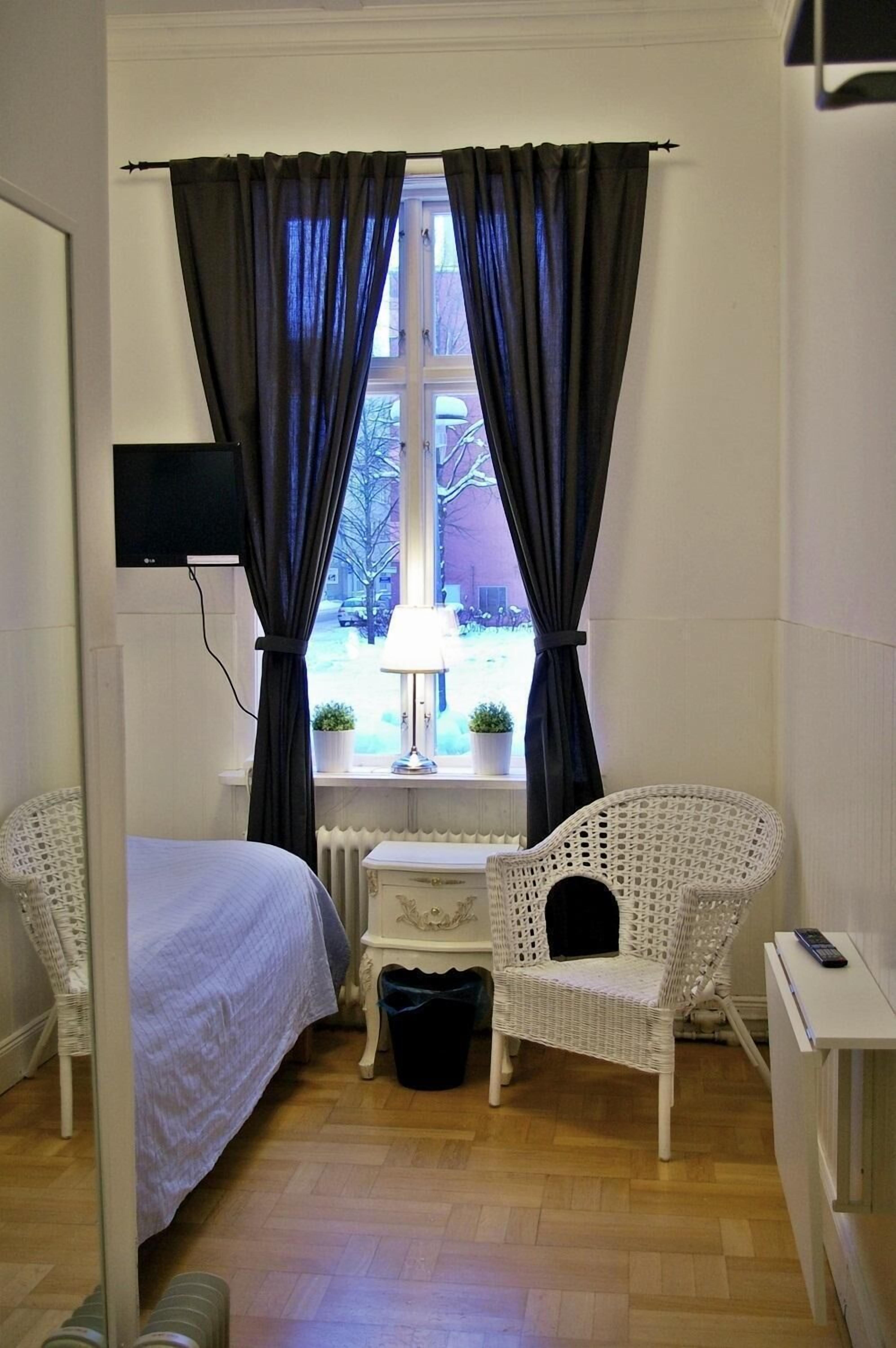 desk, blackout curtains, iron/ironing board, free wifi