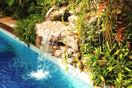 Outdoor pool, open 9 AM to 10 PM, sun loungers