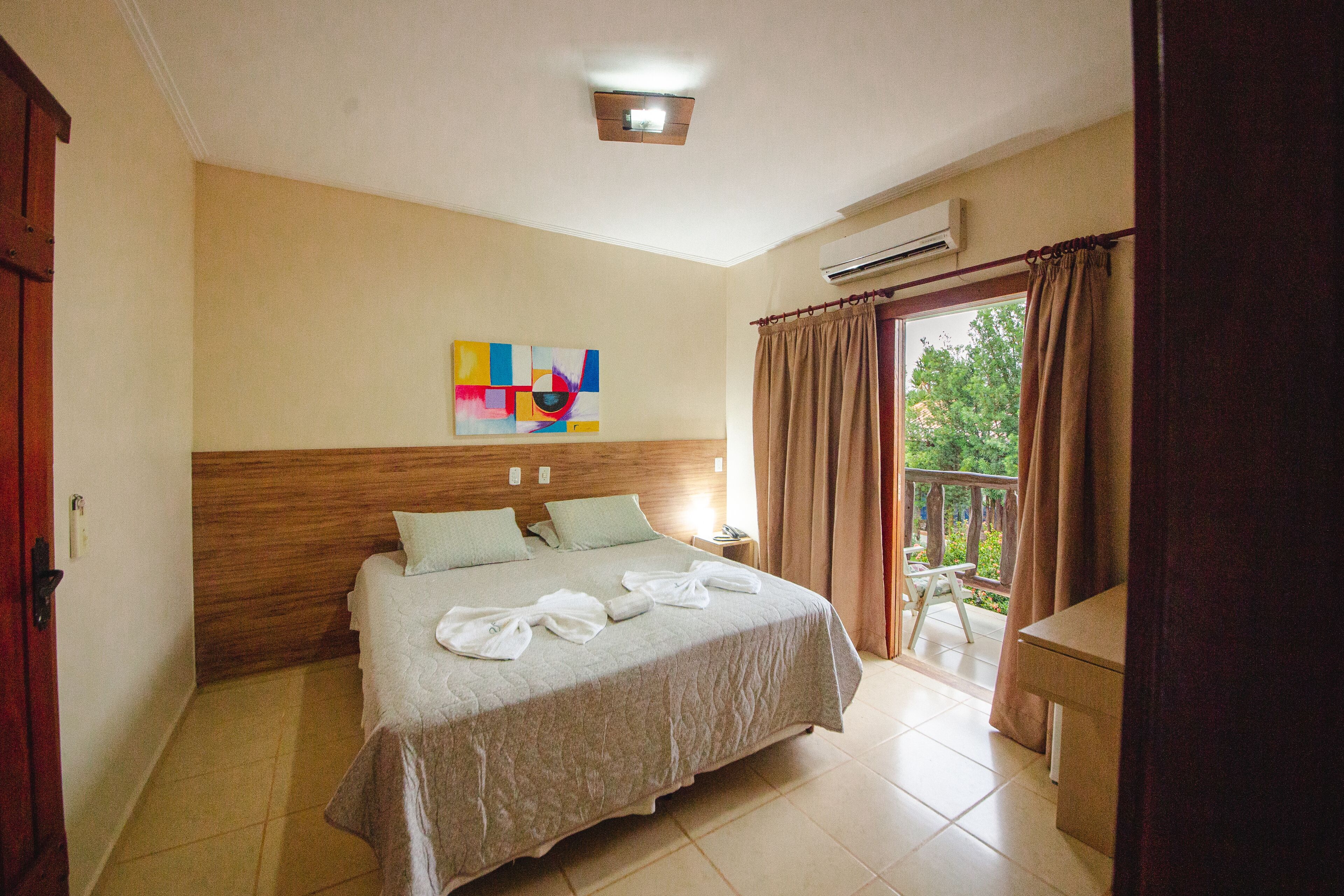 Habitación cuádruple superior | Minibar y caja fuerte