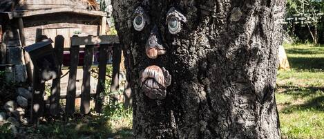 A tree with a carved face.