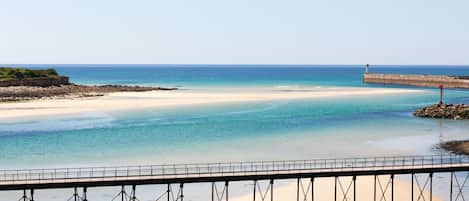 On the beach, waterskiing, windsurfing, kayaking