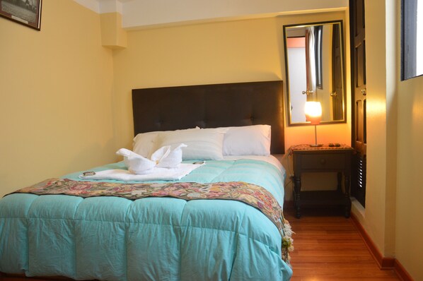 Premium bedding, down duvets, in-room safe, desk