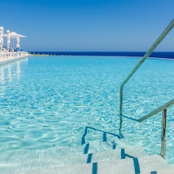 Outdoor pool, open 10 AM to 6 PM, sun loungers