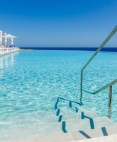 Outdoor pool, open 10 AM to 6 PM, sun loungers