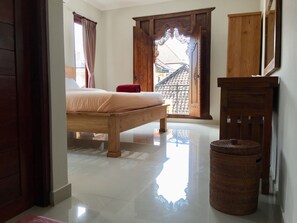 Economy Double Room, 1 King Bed, Terrace, Garden View | Memory-foam beds, in-room safe, individually decorated - Wina Ubud B&B (Ubud)