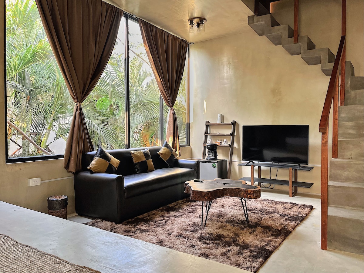 living room of one of the apartments in Pacha Tulum Boutique Hotel