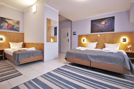 Triple Room (Air condition) | In-room safe, desk, blackout drapes, free WiFi