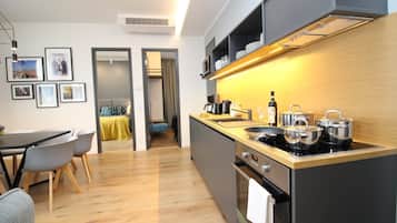 Fridge, microwave, stovetop, coffee/tea maker