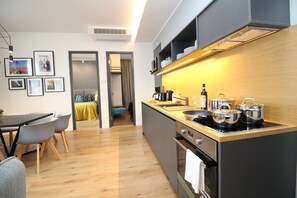 Fridge, microwave, stovetop, coffee/tea maker