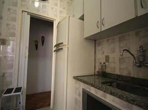 Standard Apartment, Multiple Beds | Private kitchen | Fridge, microwave, coffee/tea maker